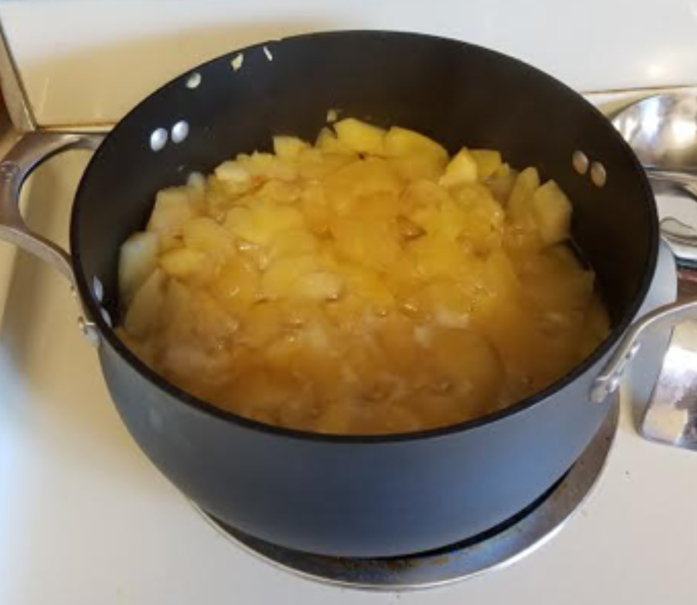Homemade apples sauce with kids